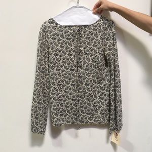 Theory floral black and cream blouse with key hole