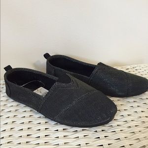 Black sparkly slip ons