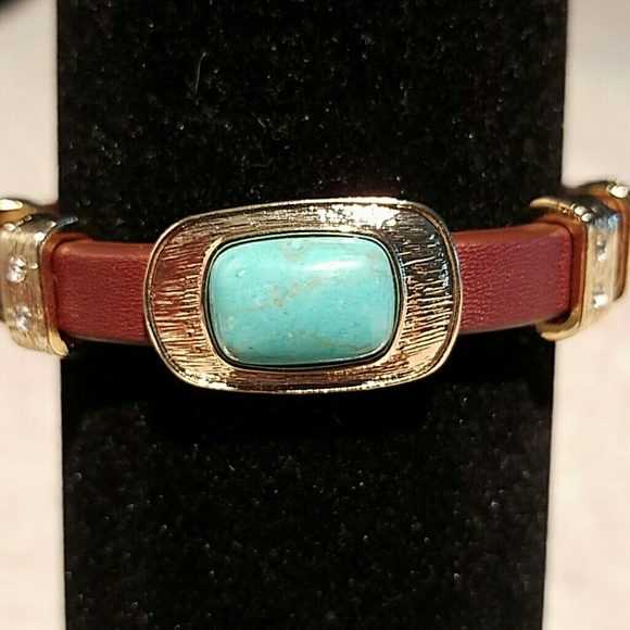 Leather bracelet with turquoise accents.