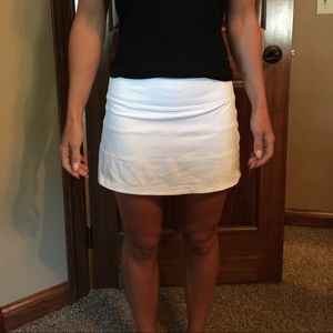 White Lululemon skirt.