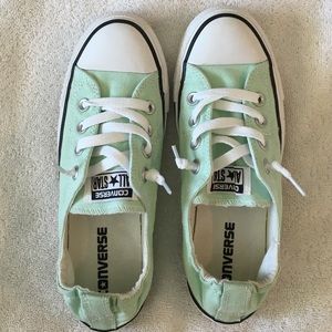 Mint green slip on converse