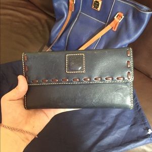 Wallet is new and is navy