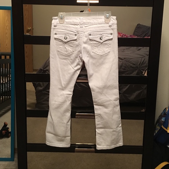 White distressed capris