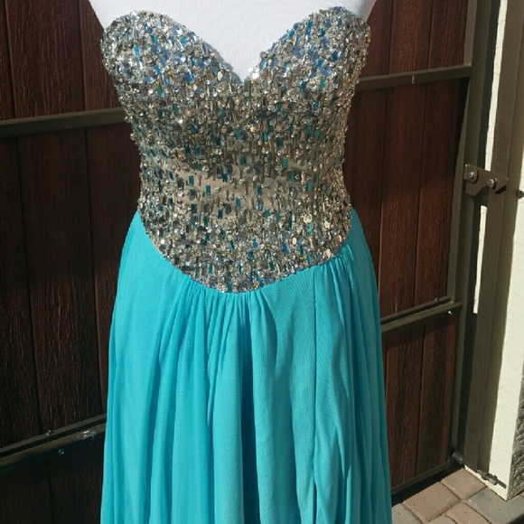 Beautiful turquoise beaded prom dress