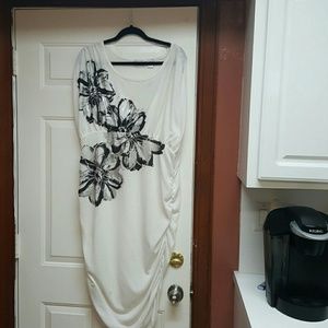 Beautiful white dress with black flowers. Dress is