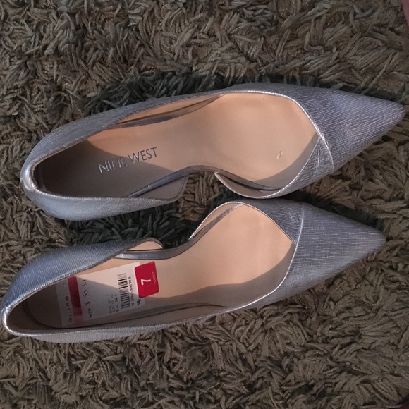 Pumps.  Very cute!  Hard to find silver.