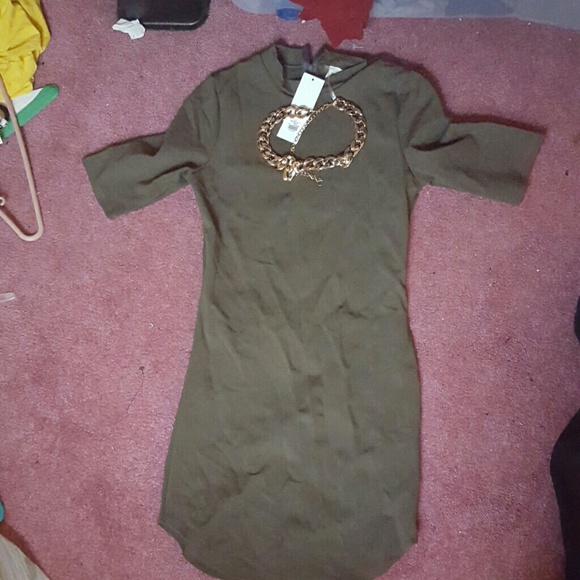 Brand new green dress with gold necklace