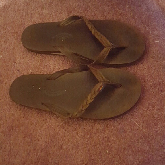 Used rainbow flip flops size 7