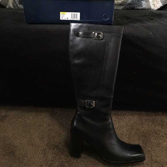 Andrew Geller leather knee high boots.