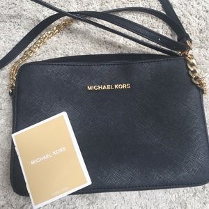 Michael Kors- Black Large Saffiano Travel Jet Set