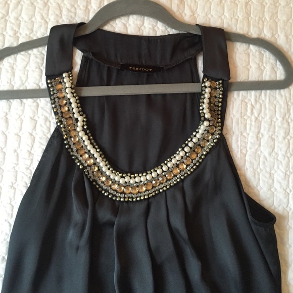 Silky top with beading.