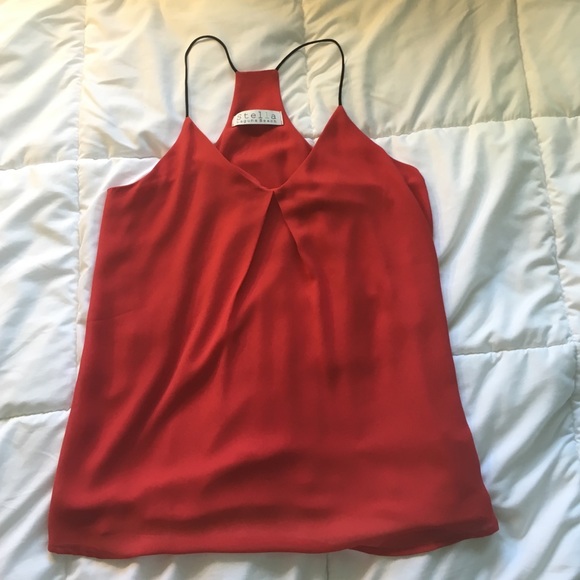Red blouse w/ black straps