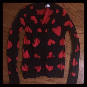 Black cardigan with hearts print