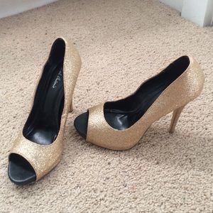 Michael Antonio gold heels