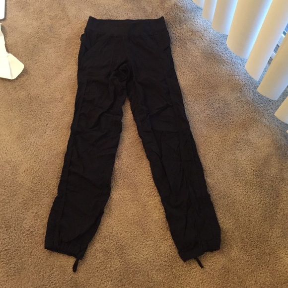Black lulu lemon ruffled pants with ties at bottom