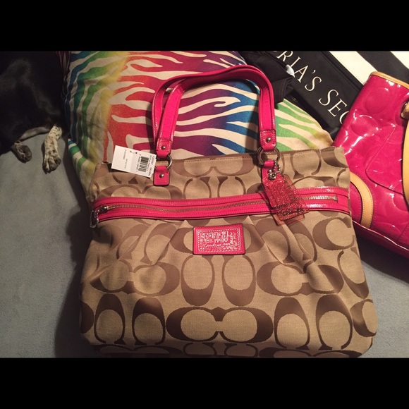 Brand new Coach purse with tags never used