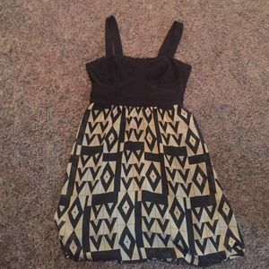 Nude and black skater dress