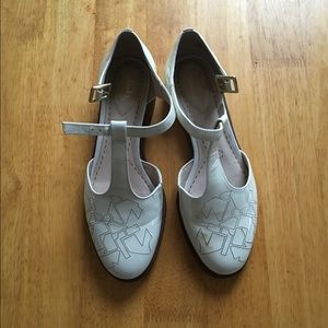 Patent leather Mary Jane flats.