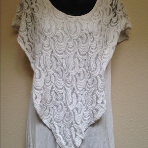 Large white loose fitted top.