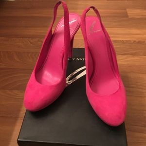 Brian Atwood suede pumps.