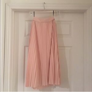 Pink pleated midi skirt