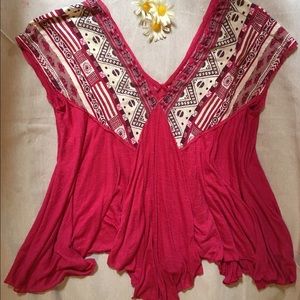 Free People asymmetrical Aztec print top.
