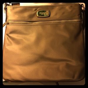 Michael Kors gold/champagne messenger bag