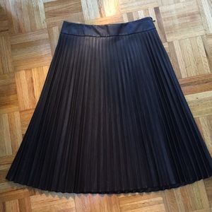 Brown leather pleated skirt.