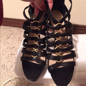 A brand new Guess kersary black sandal