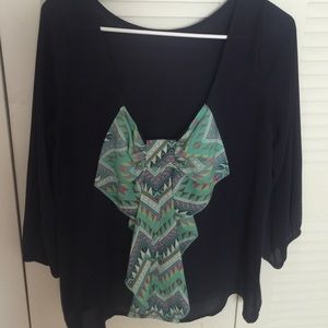 Navy blue blouse with Aztec bow detailed on back