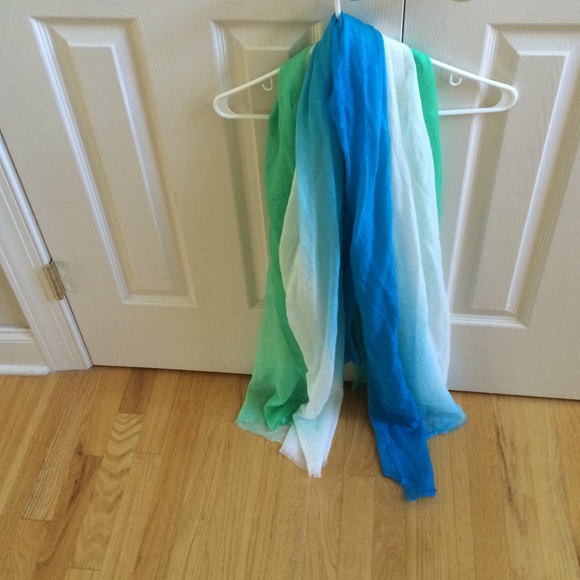 A large square scarf. Green, blue and white