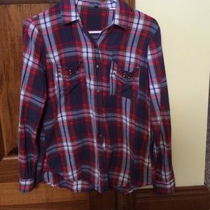 Long sleeve flannel shirt.