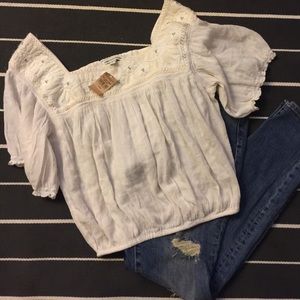 Elegant embroidered peasant top!