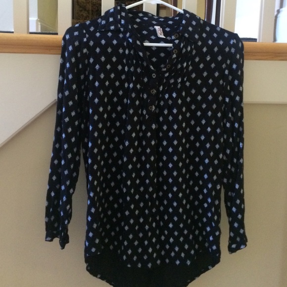A black patterned blouse