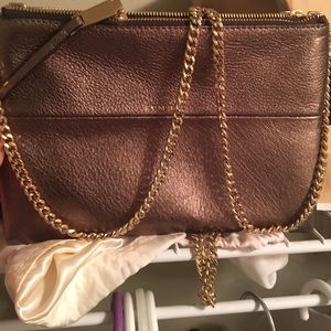 Coach crass body with chain