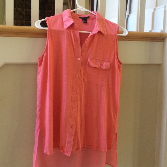 A coral tank top *top button missing*