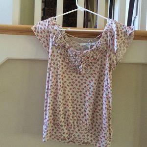 A patterned short sleeve top