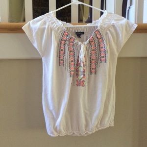 A white short sleeve top