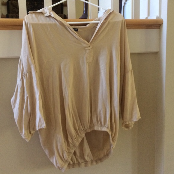 A tan chiffon blouse