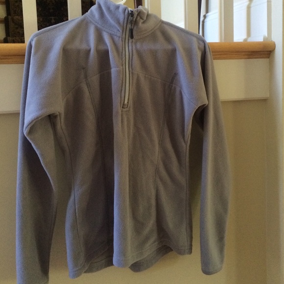 A gray quarter zip