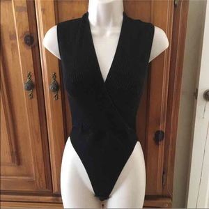 Sleeveless, cross front black ribbed bodysuit!