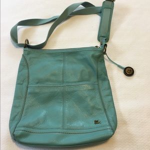 Genuine leather Sak crossbody in Coolwater color.