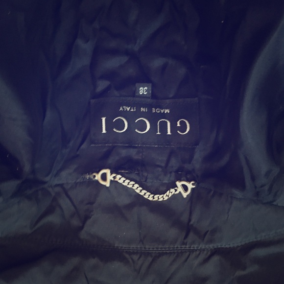 A Gucci trench rain coat