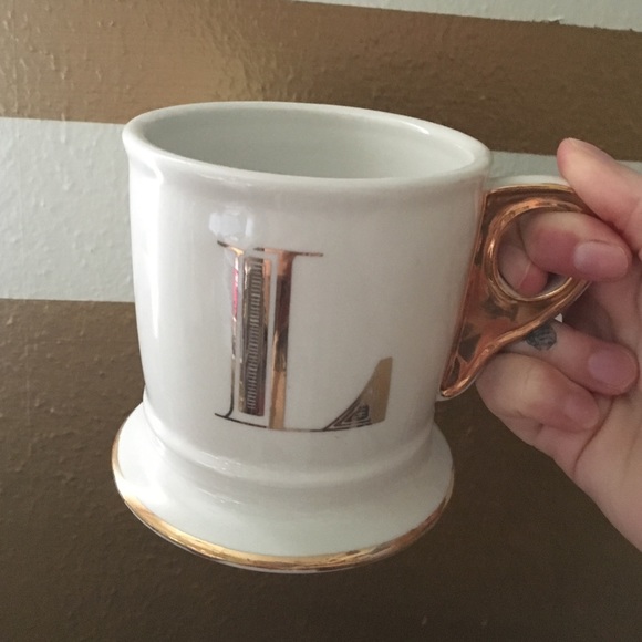 Anthropologie gold letter mug in "L"