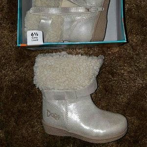Brand new in box size 6.5 gold boots