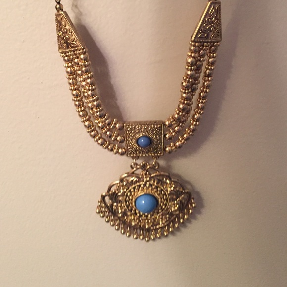 😍25% off 2+😍Gold and teal tribal statement