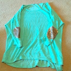 Aqua shirt with sequin elbows