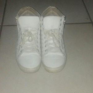 White sneakers.