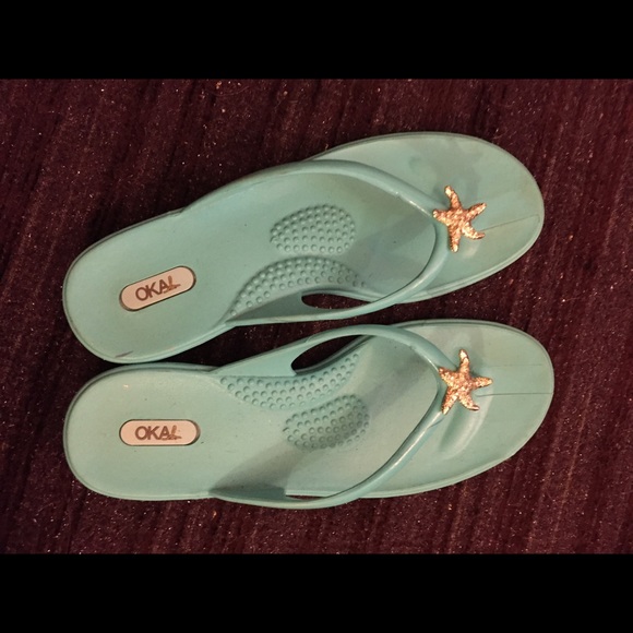 Oka b blue flip flops with gold starfish