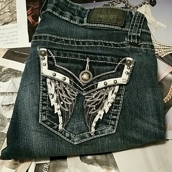 Zco skinny jeans with angel wing pockets.